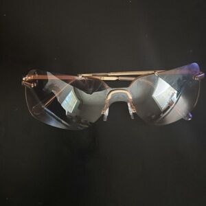 Brown and gold trimmed sunglasses.